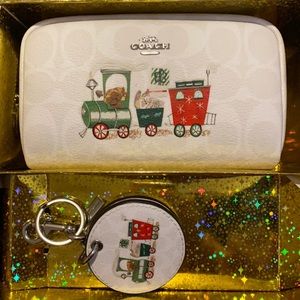 Coach holiday limited edition makeup bag.